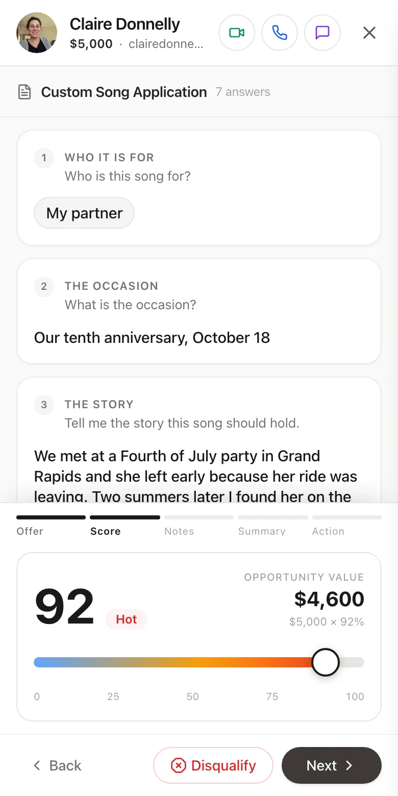 A $5,000 custom song application under review on a phone: the applicant's answers as one card per step, and docked underneath, a score of 92 marked Hot on a slider worth $4,600, with Disqualify and Next buttons in thumb reach